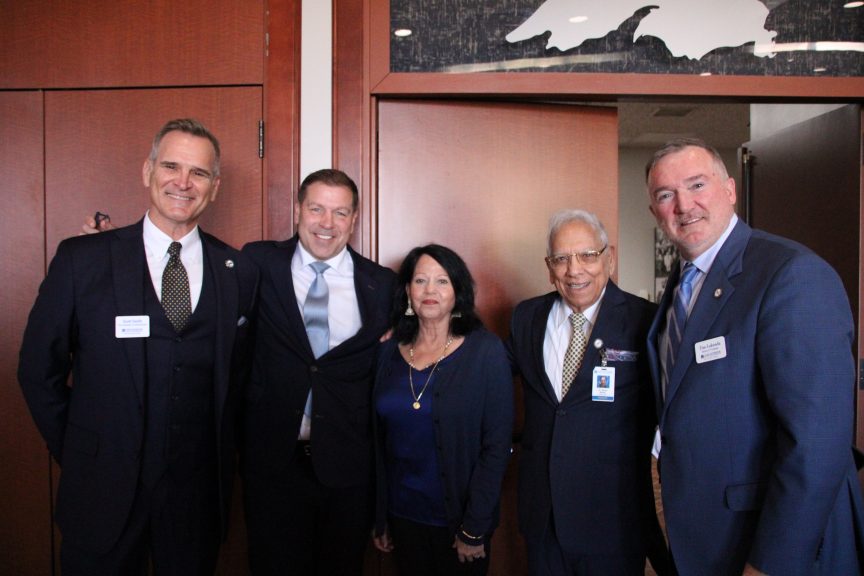 Scott Smith, Doug Weight '91, Karuna & Madan Saluja and Tim Lukenda