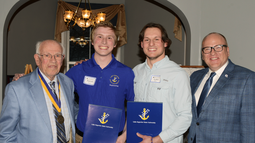 Pictured (L-R): Art Disbrow ’53, Golden Grad and representative of the award committee; Aaron Heath is from Hanover, MI; Luke Brcic from Lennon, MI; and LSSU President Hanley.