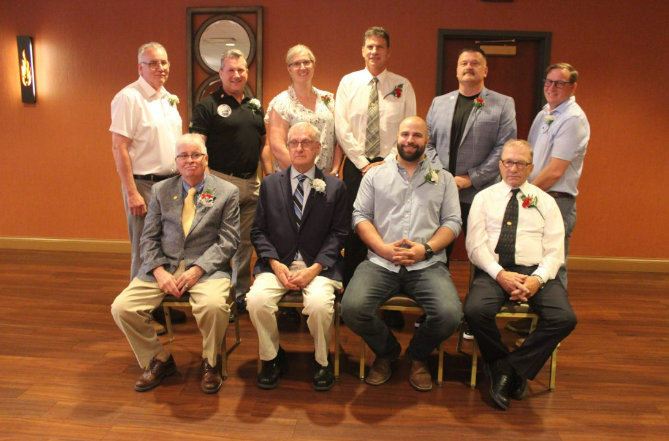 John Pistulka pictured with the 50th class being inducted to the Upper Peninsula Sports Hall of Fame